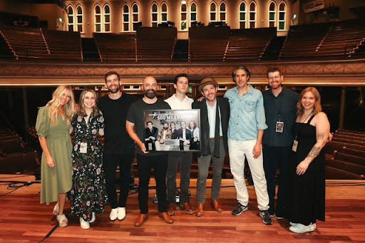 Plaque Presentation at the Ryman Theatre  L to R: Ellie Holcomb, Samantha Steele, Nathan Dugger, Drew Holcomb, Ian Miller, Rich Brinsfield, Will Sayles, Paul Steele, and Morgan Combs